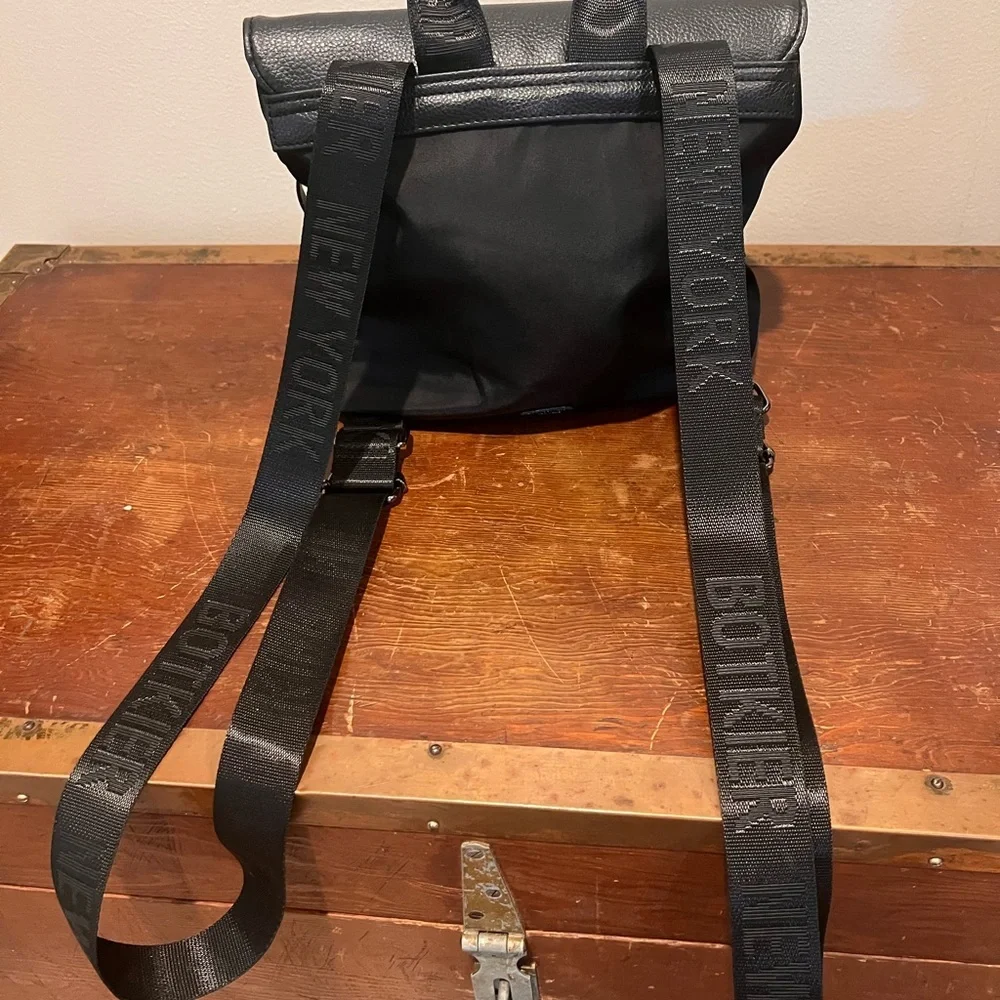 Small black backpack for woman (TP for size comparison)